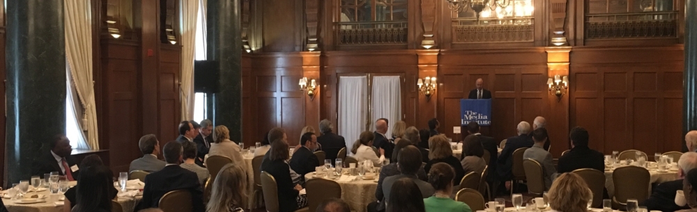 discusses advertising, consumer choice, and the future of media at a Communications Forum luncheon